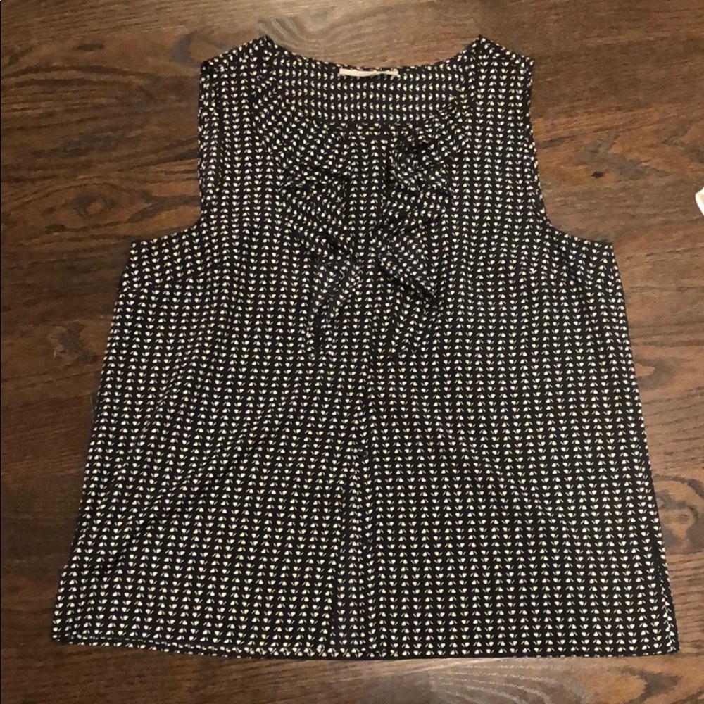 Black and white ruffled front tank